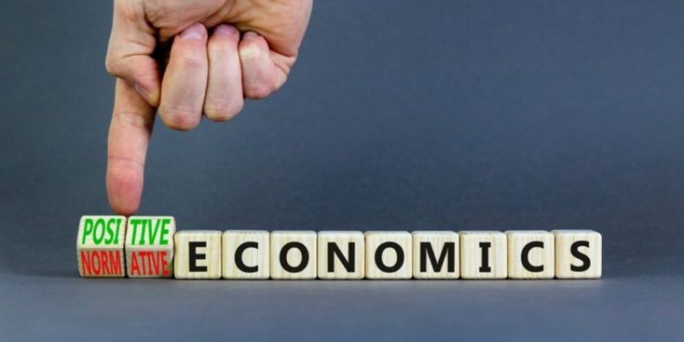What is positive vs normative economics?