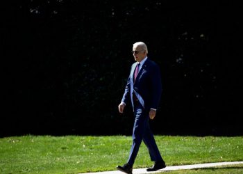 Strong economy can be double-edged sword for Biden if rates stay high