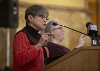 Kansas governor vetoes a ban on gender-affirming care; GOP vows override