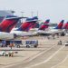 Delta cancels hundreds more flights as DOT opens probe
