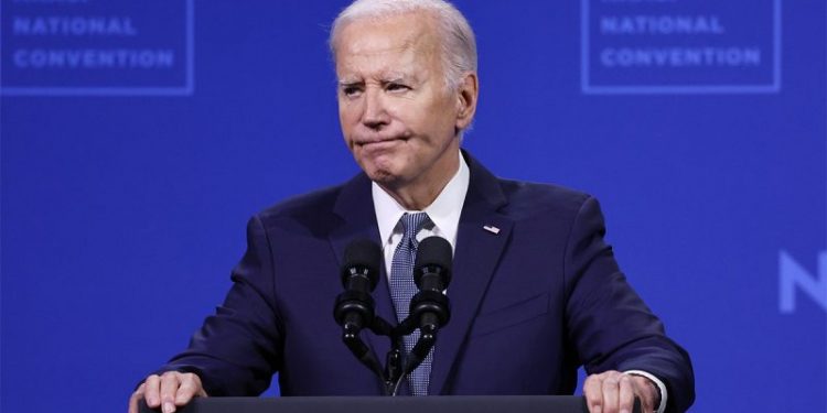 Five more House Democrats call on Biden to drop out, third US senator
