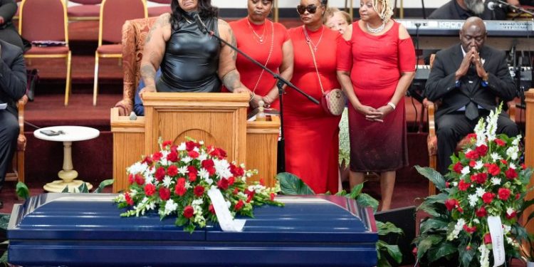 Four people charged with murder after restraining man outside Milwaukee hotel