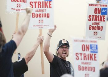 Boeing factory workers strike after overwhelmingly rejecting contract