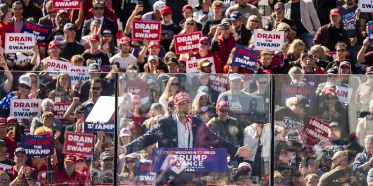 Trump dismisses new warnings of Russian interference in election