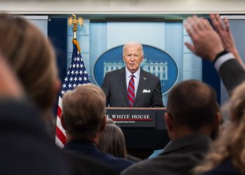 In surprise visit with reporters, Biden shares concerns about election violence